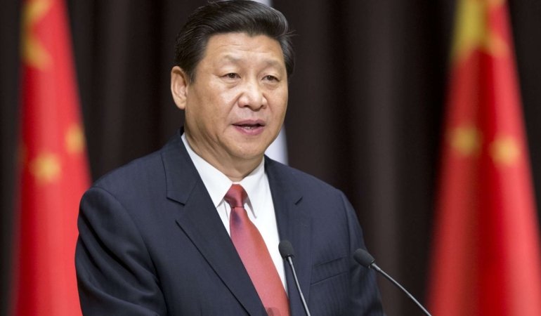 Xi