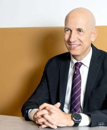 Kocher-Uyardi-Gumruk-Vergileri-ABD-Enflasyonunu-Hizlandirir-featured