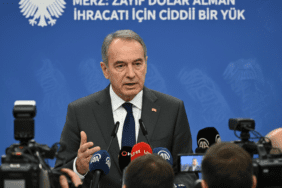 Merz-Zayif-Dolar-Alman-Ihracati-Icin-Ciddi-Bir-Yuk-gemini